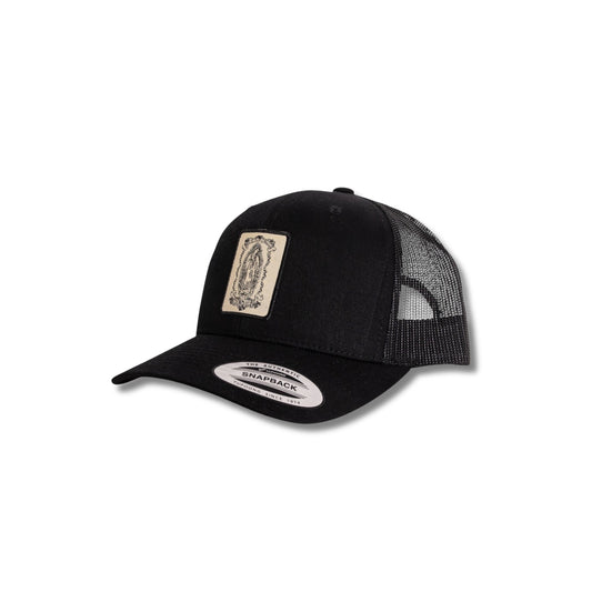Casquette noire trucker avec patch brodé style urbain bohème chic Santa Maria Concept Store