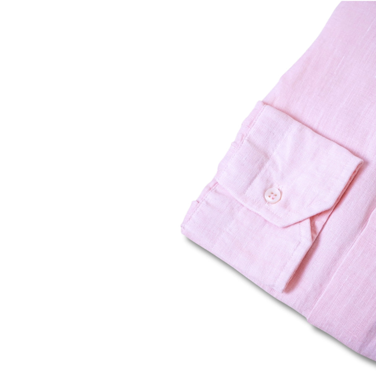Détail du boutons de la chemise en lin Santa Maria rose
